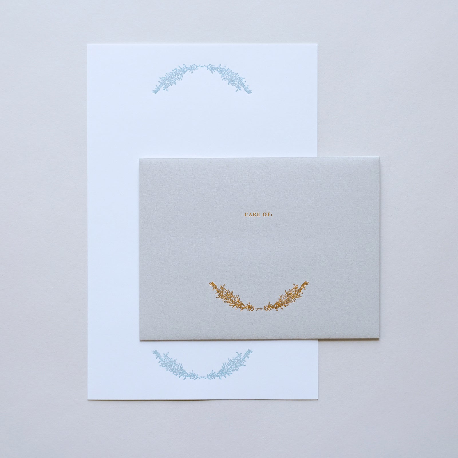 "CARE OF" letter paper and matching envelope.