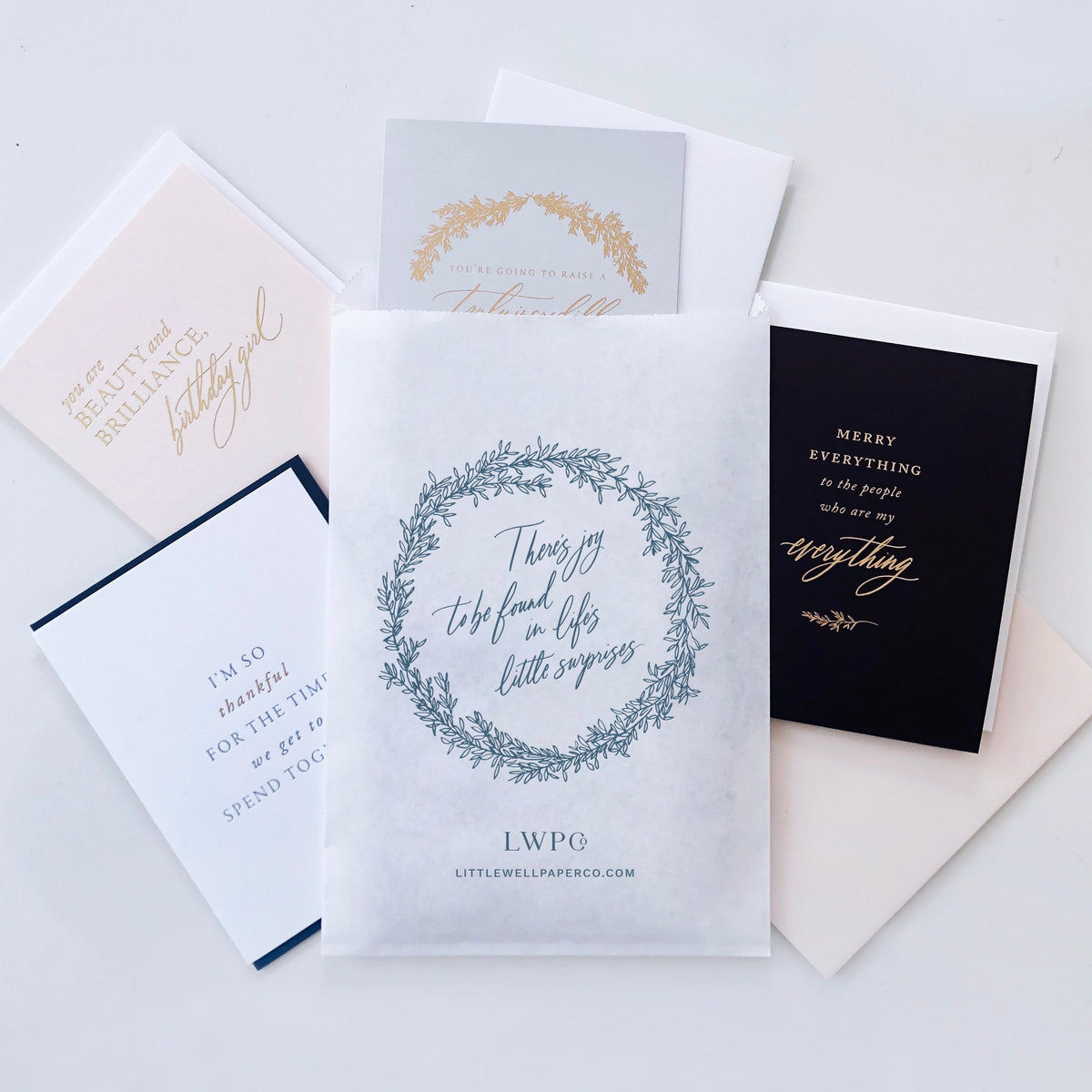 Variety of Little Well Paper Company greeting cards with matching envelopes.