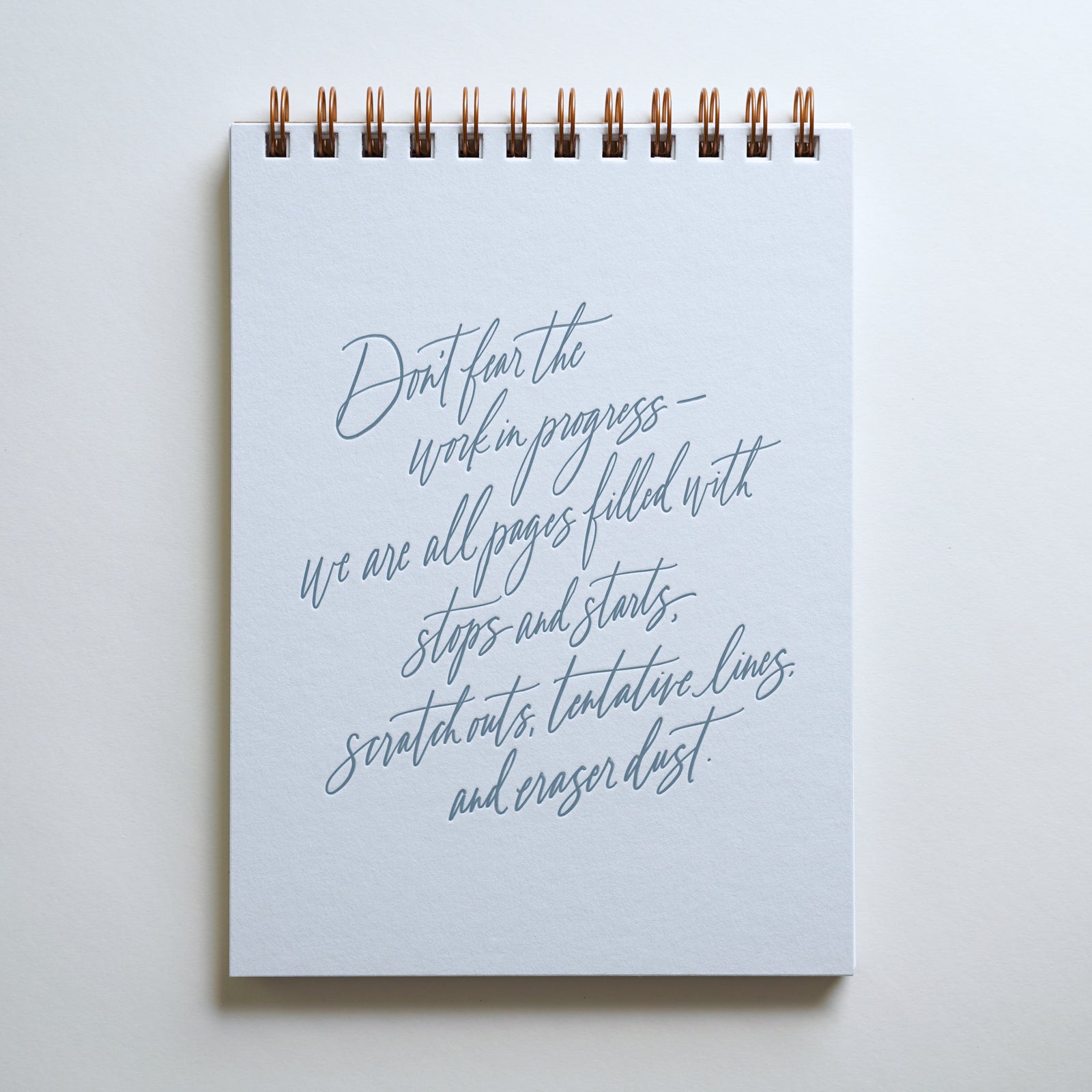 "Don't Fear the Work in Progress" notebook is letterpress printed on a vintage press.