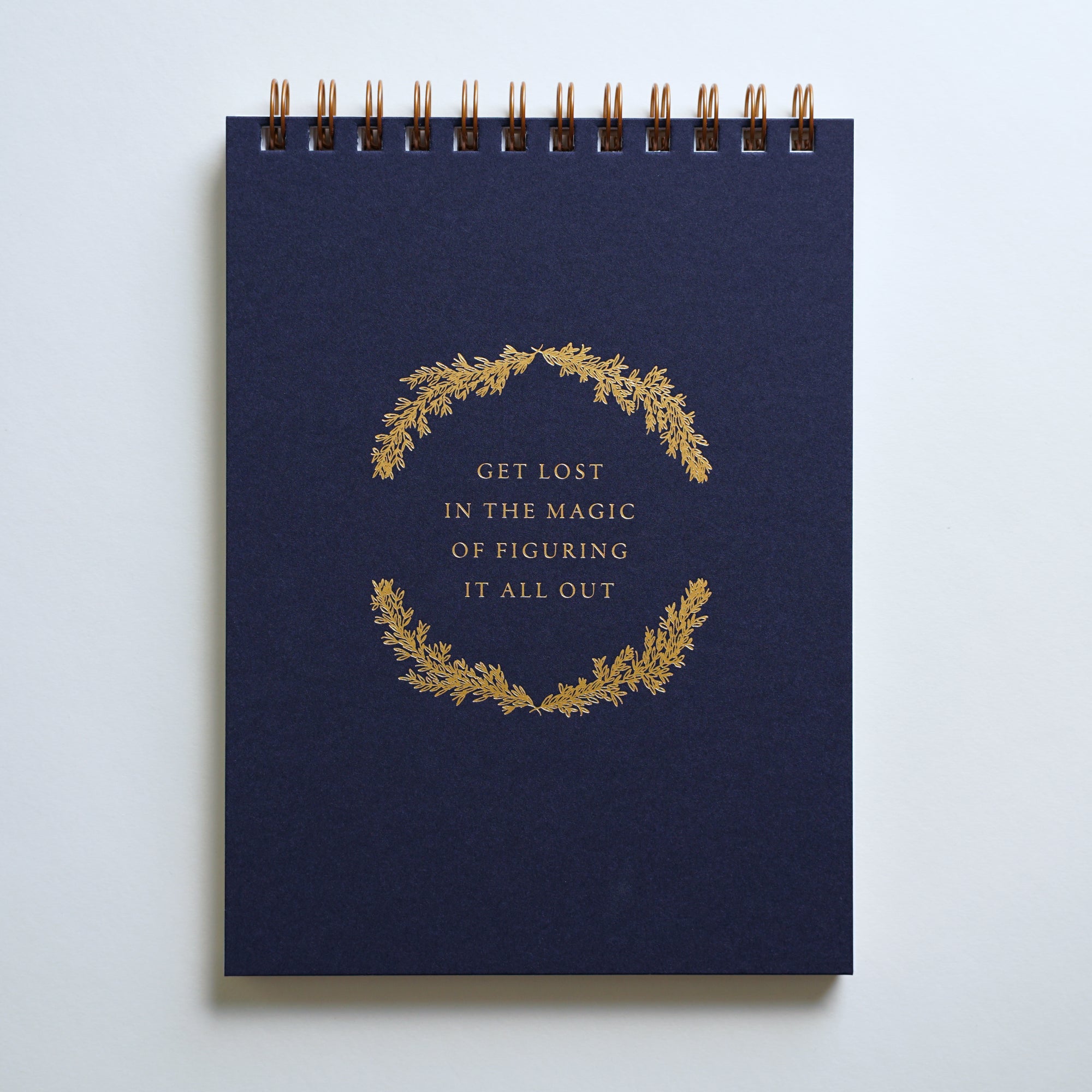 "Lost in the Magic" notebook, letterpress printed by hand in gold foil.
