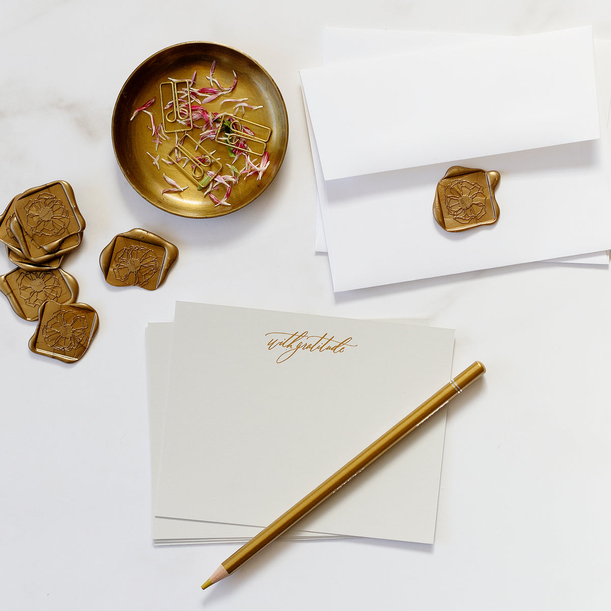Our &quot;Gratitude&quot; flat note stationery set includes a set of 6 foil printed cards and envelopes with 6 professional grade, self adhesive wax seals.